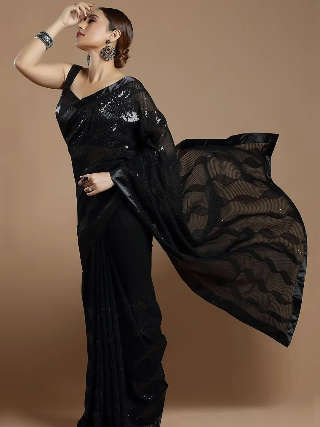 Gorgeous Black Wavy Georgette Saree With Sequins