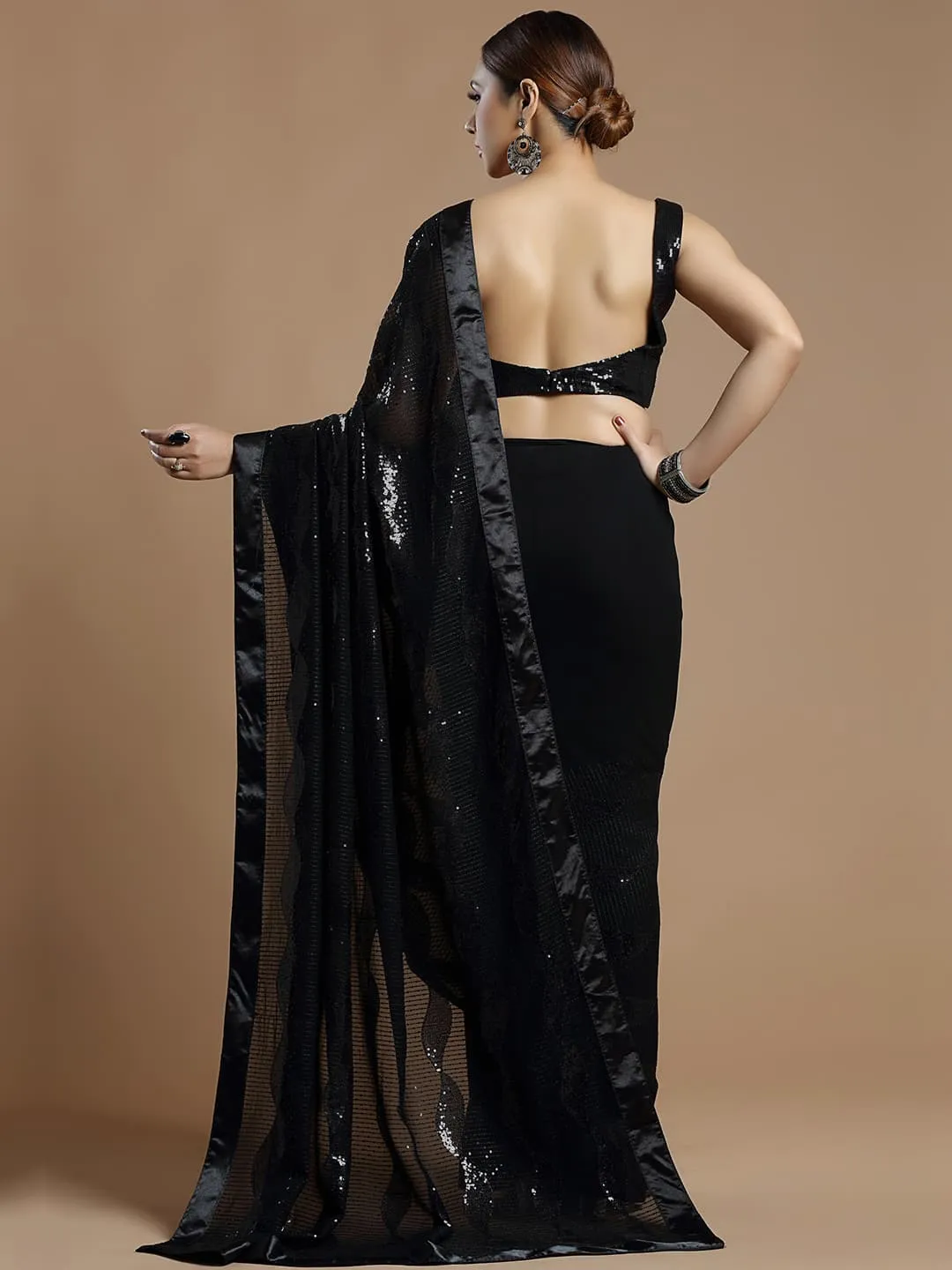 Gorgeous Black Wavy Georgette Saree With Sequins