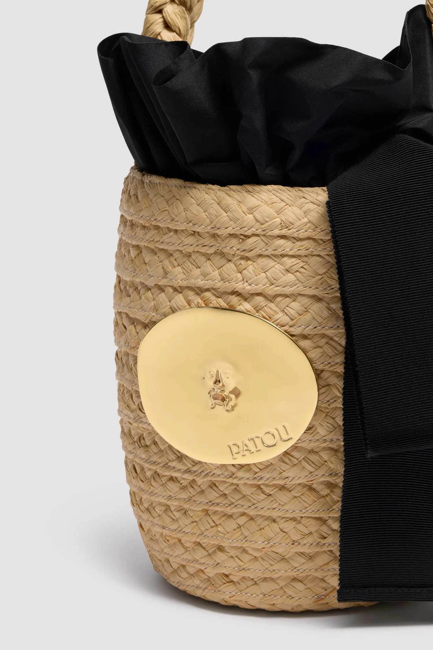 Iconic bucket bag in raffia